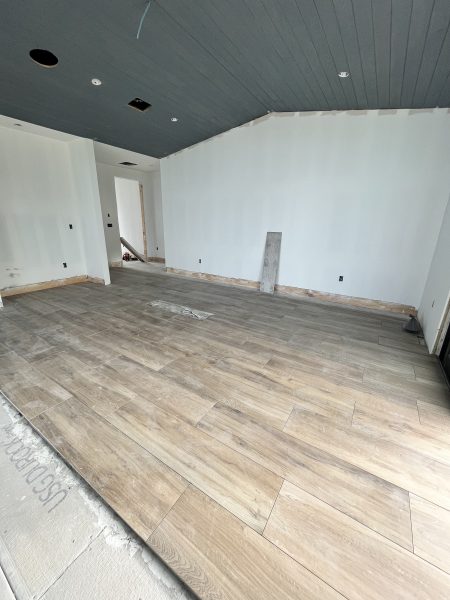 Tile going in at Lighthouse a D'Asign Source design-build project