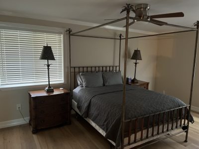 Guest bedroom at Happy House, a D'Asign Source design-build project