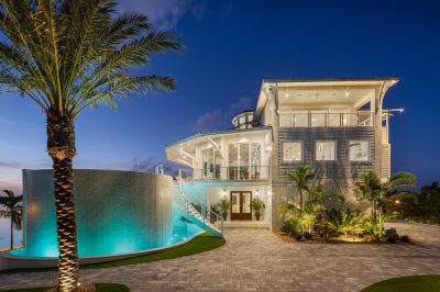 Exterior night at Lighthouse Pointe, a D'Asign Source design-build