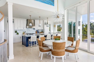 Kitchen and dining at Lighthouse Pointe, a D'Asign Source design-build