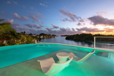 Pool sun shelf at Lighthouse Pointe, a D'Asign Source design-build project.