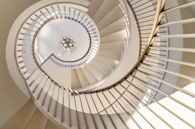 Custom spiral staircase at Lighthouse Pointe, a D'Asign Source design-build