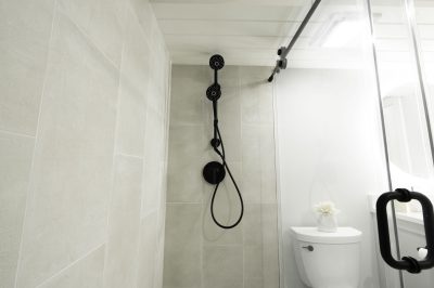 Guest bathroom at Marthaler, a condo remodel project by D'Asign Source