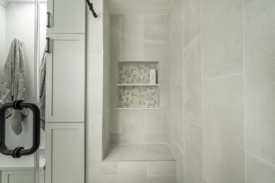 Guest bathroom at Marthaler, a condo remodel project by D'Asign Source