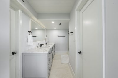 Primary bathroom at Marthaler, a condo remodel project by D'Asign Source