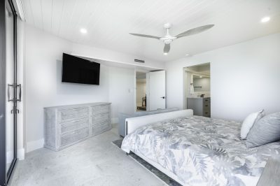 Primary bedroom at Marthaler, a condo renovation project by D'Asign Source