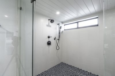 Primary bathroom at Marthaler, a condo renovation project by D'Asign Source
