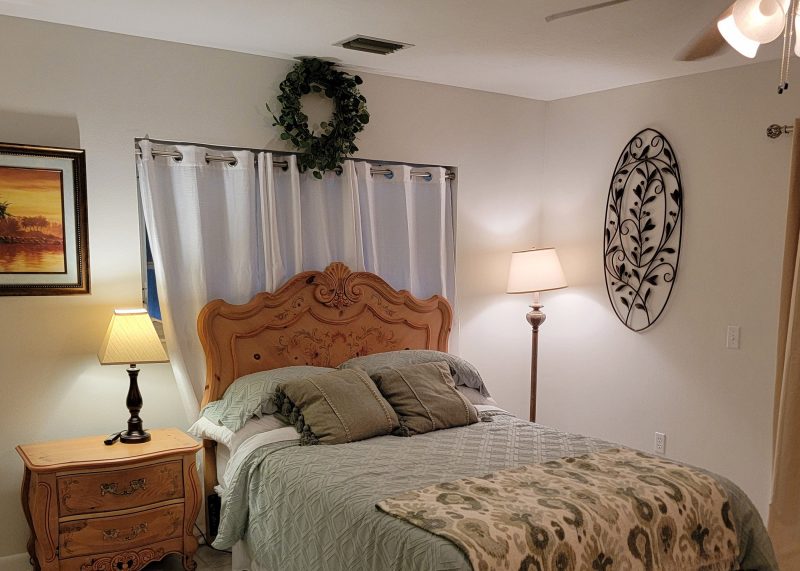 Guest bedroom before at Sapphire & Mahogany, a D'Asign Source renovation project