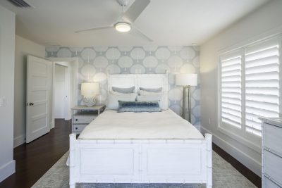 Guest bedroom at Sapphire & Mahogany, a remodel project of D'Asign Source.