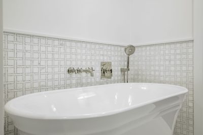 Primary bathroom at Sapphire & Mahogany, a remodel project of D'Asign Source.