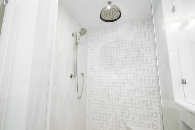 Primary bathroom at Sapphire & Mahogany, a remodel project of D'Asign Source.