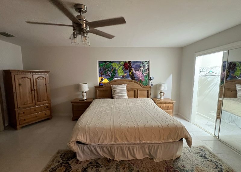 Primary bedroom before at Sapphire & Mahogany, a D'Asign Source renovation project