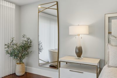 Primary bedroom at Sapphire & Mahogany, a remodel project of D'Asign Source.